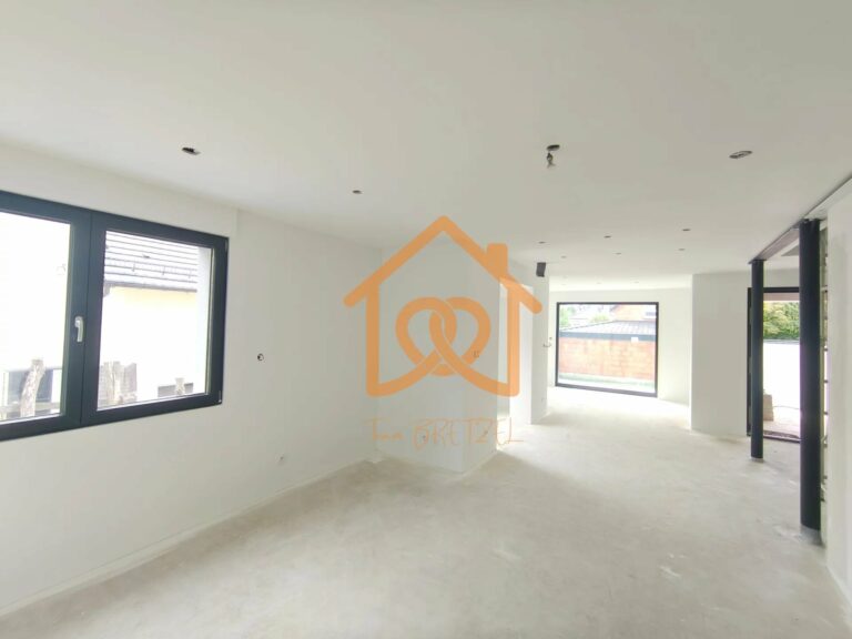 À Geispolsheim Village : Appartement avec garage, parking et un are de terrain - Premi'home Agence immobilière Aix En Provence