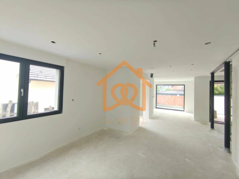 À Geispolsheim Village : Appartement avec garage, parking et un are de terrain - Premi'home Agence immobilière Aix En Provence