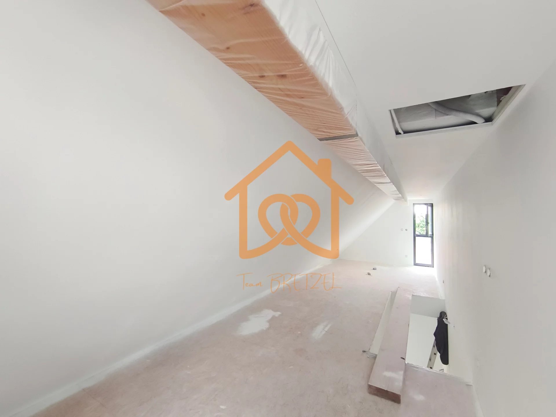 À Geispolsheim Village : Appartement avec garage, parking et un are de terrain - Premi'home Agence immobilière Aix En Provence