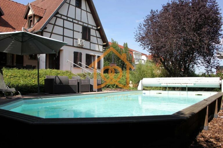 En exclusivité Jolie Maison de 150m² au sol à HOLTZHEIM avec piscine chauffée, climatisation sur 7 ares de terrain - Premi'home Agence immobilière Aix En Provence