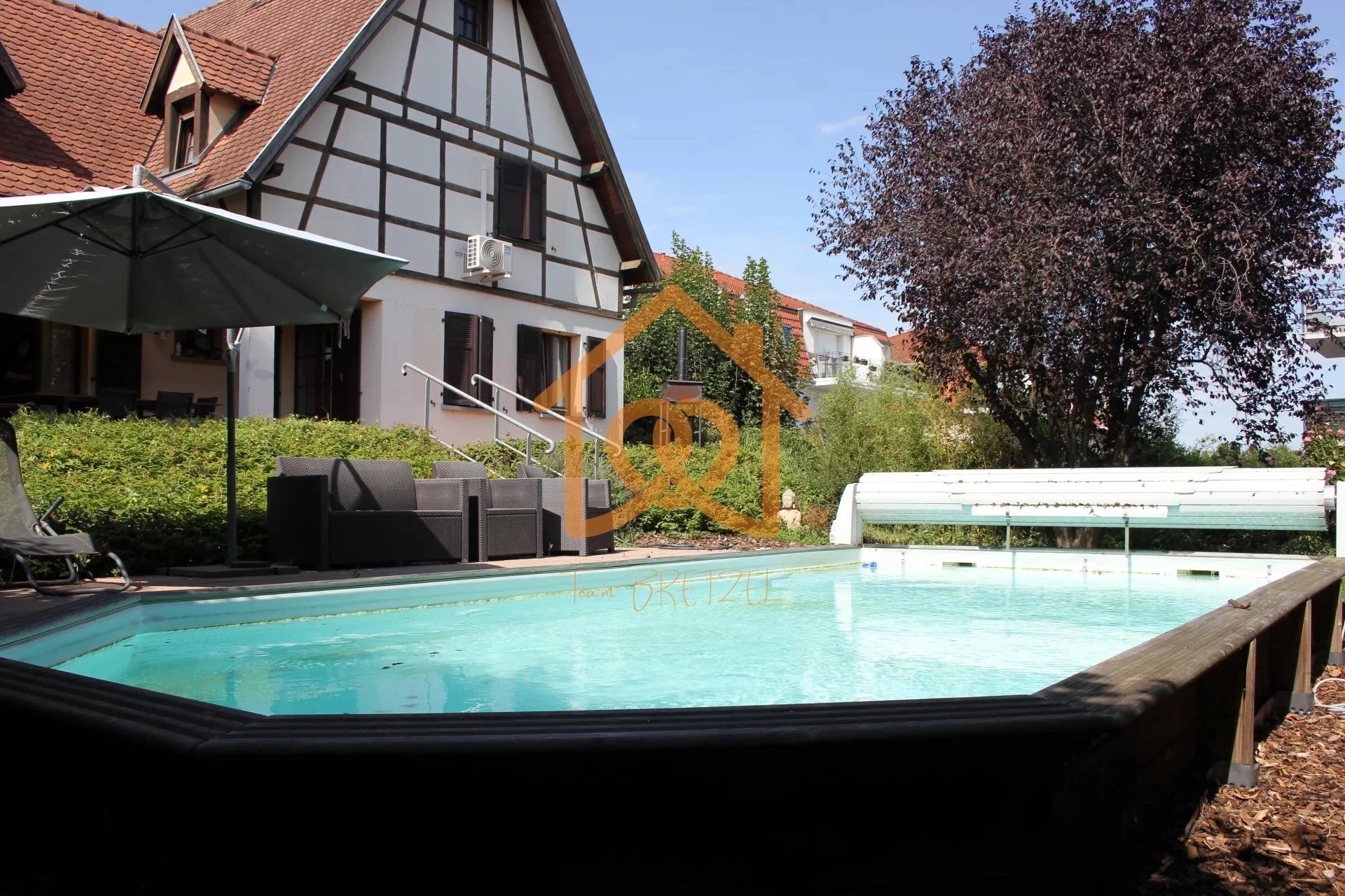 En exclusivité Jolie Maison de 150m² au sol à HOLTZHEIM avec piscine chauffée, climatisation sur 7 ares de terrain - Premi'home Agence immobilière Aix En Provence