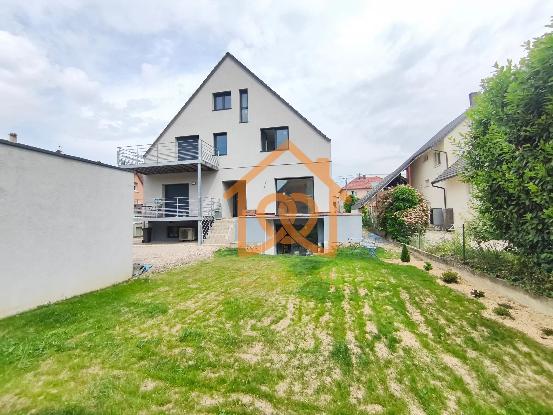 À Geispolsheim Village : Appartement avec garage, parking et un are de terrain - Premi'home Agence immobilière Aix En Provence