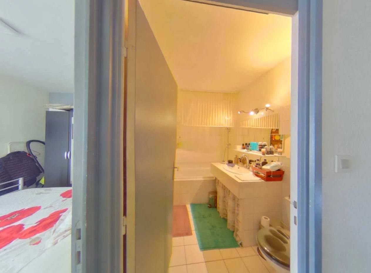 Appartement 2 pièces 45m² avec jardin au bord d’un bras de l’Ill - Premi'home Agence immobilière Aix En Provence