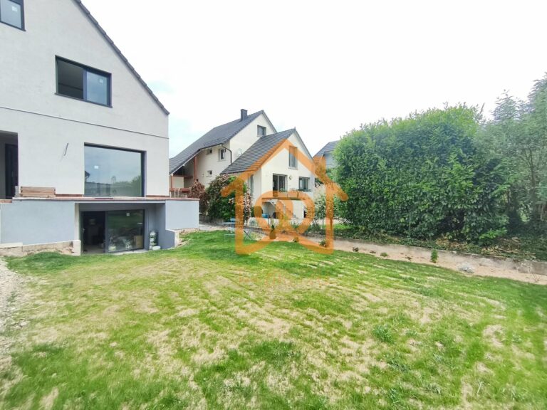 À Geispolsheim Village : Appartement avec garage, parking et un are de terrain - Premi'home Agence immobilière Aix En Provence