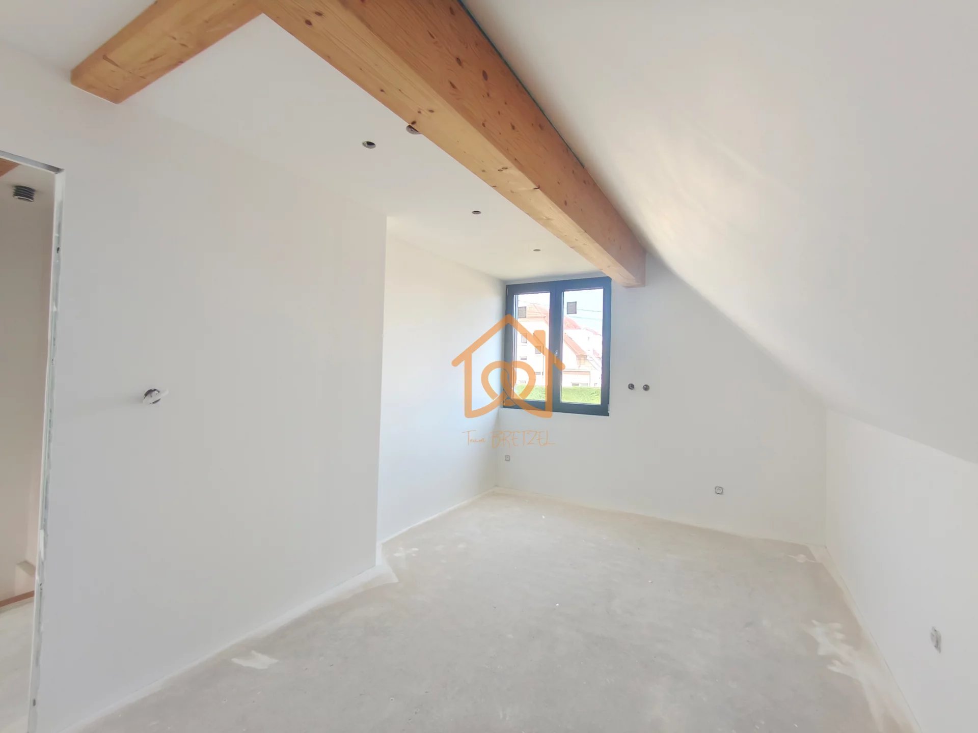 À Geispolsheim Village : Appartement avec garage, parking cave intégrale et un are de terrain - Premi'home Agence immobilière Aix En Provence