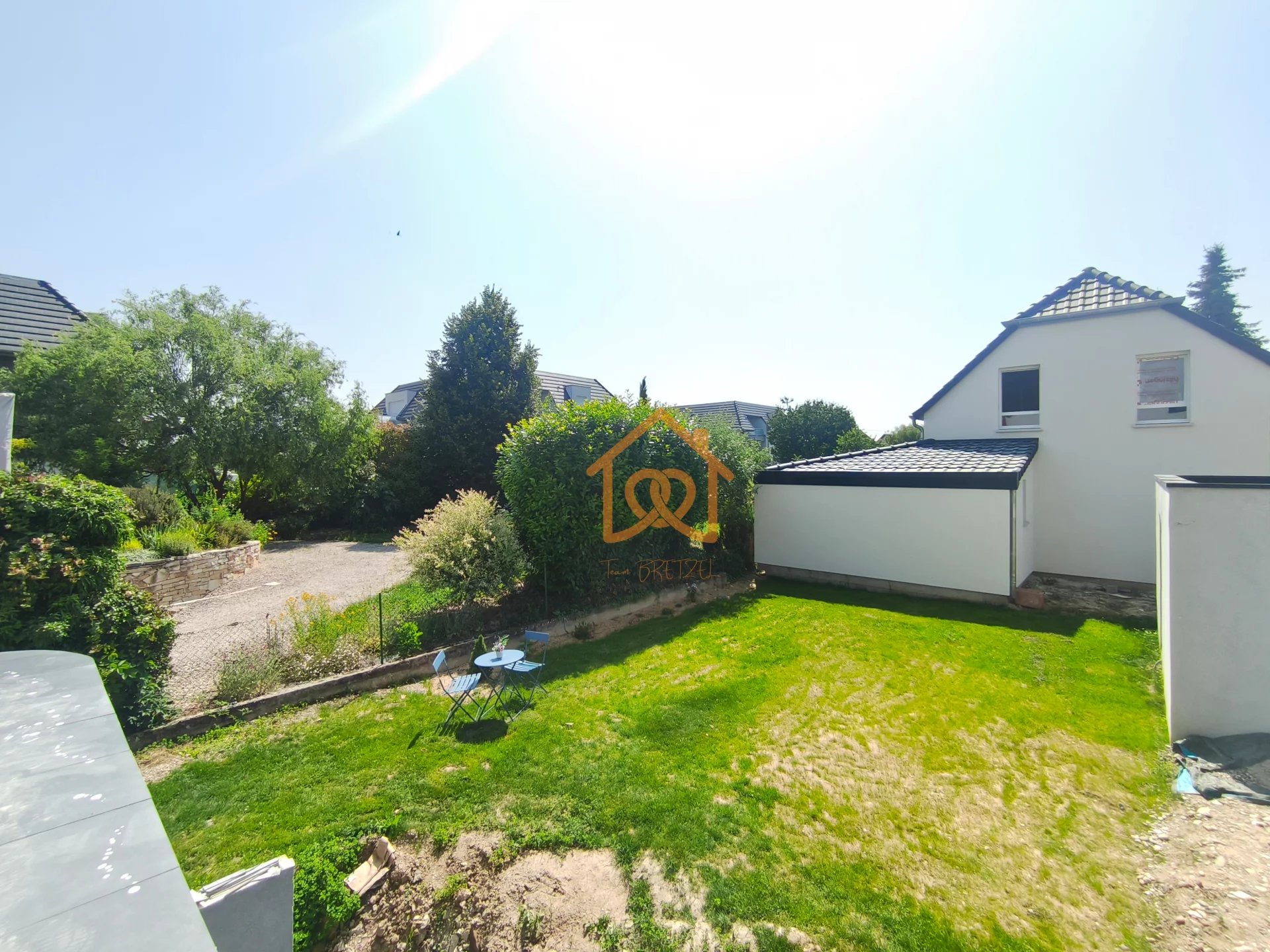 À Geispolsheim Village : Appartement avec garage, parking et un are de terrain - Premi'home Agence immobilière Aix En Provence